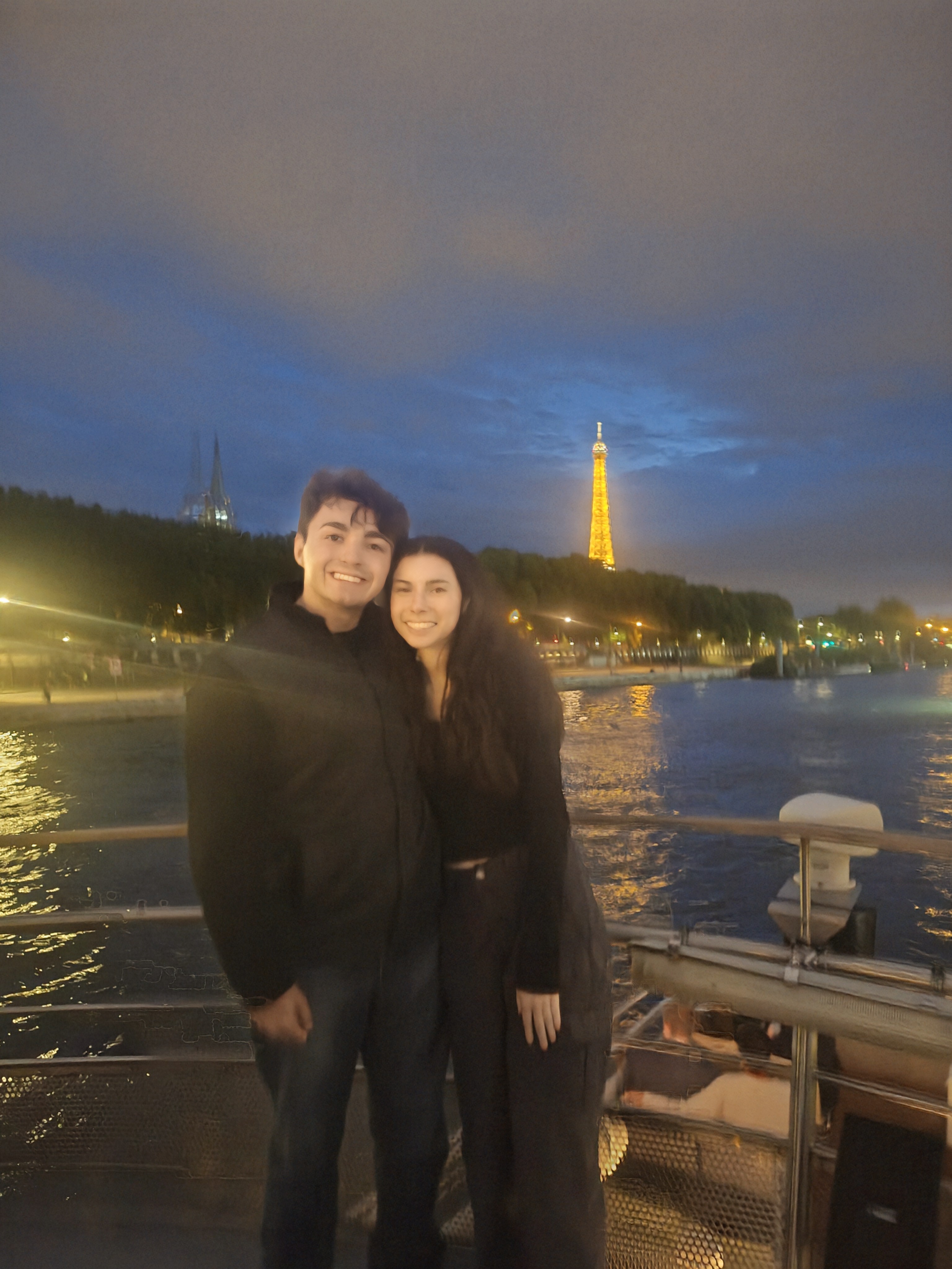 Us together in Paris with the Eiffel Tower behind us